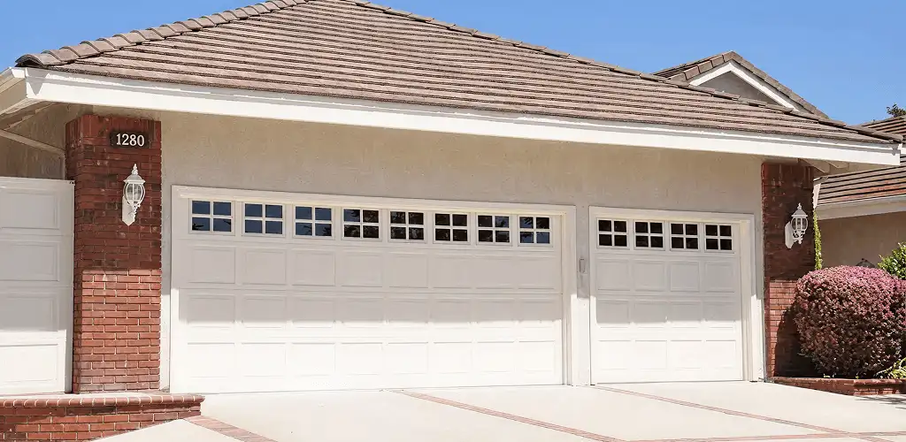 Residential garage door repair service for a double garage door in Provo, UT