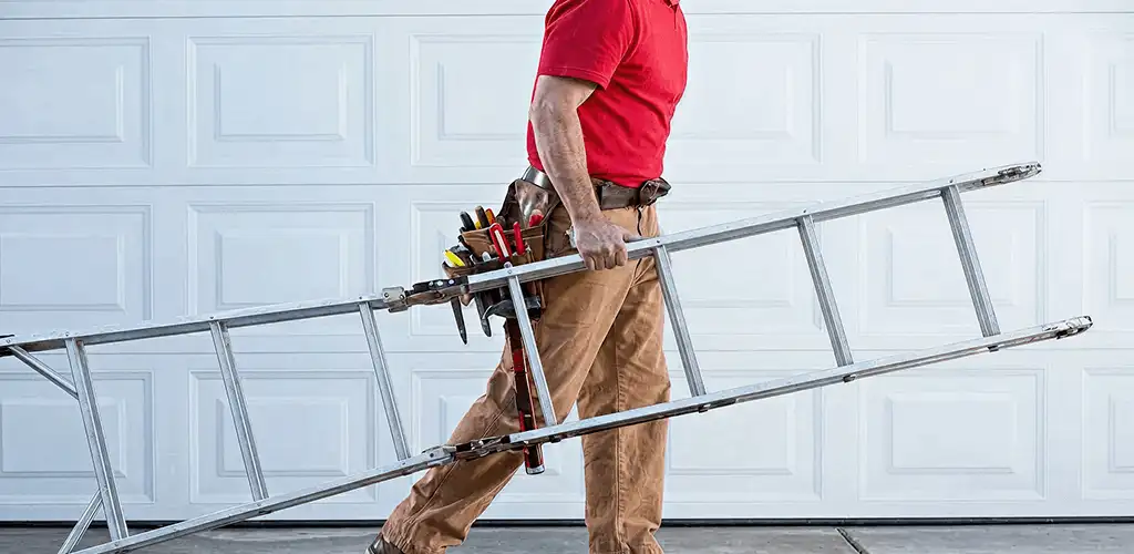 Garage door repair technician arriving with tools and ladder in Provo, UT