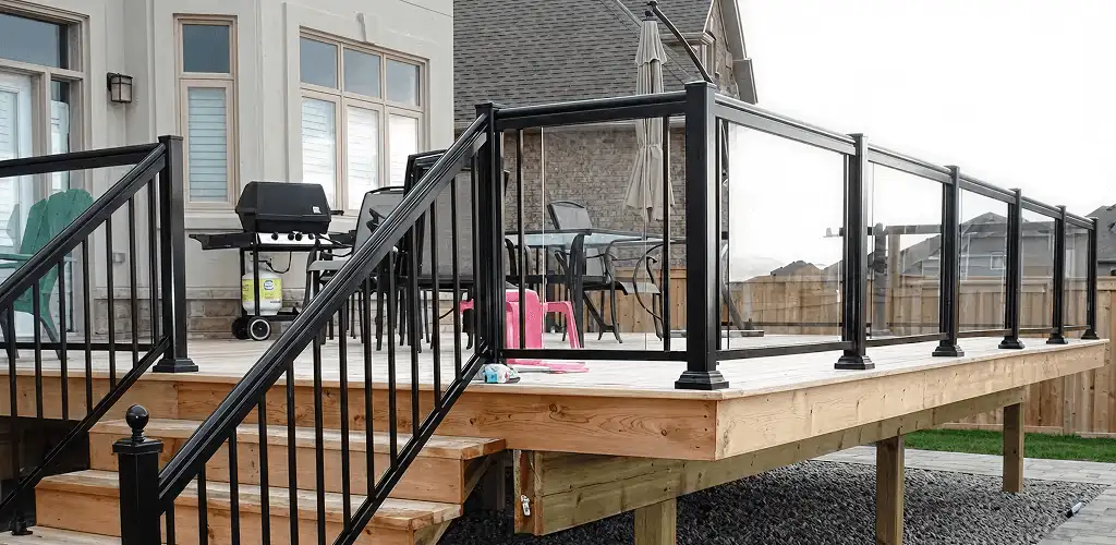 Handrail installation on a deck staircase for safety and code compliance in Provo, UT